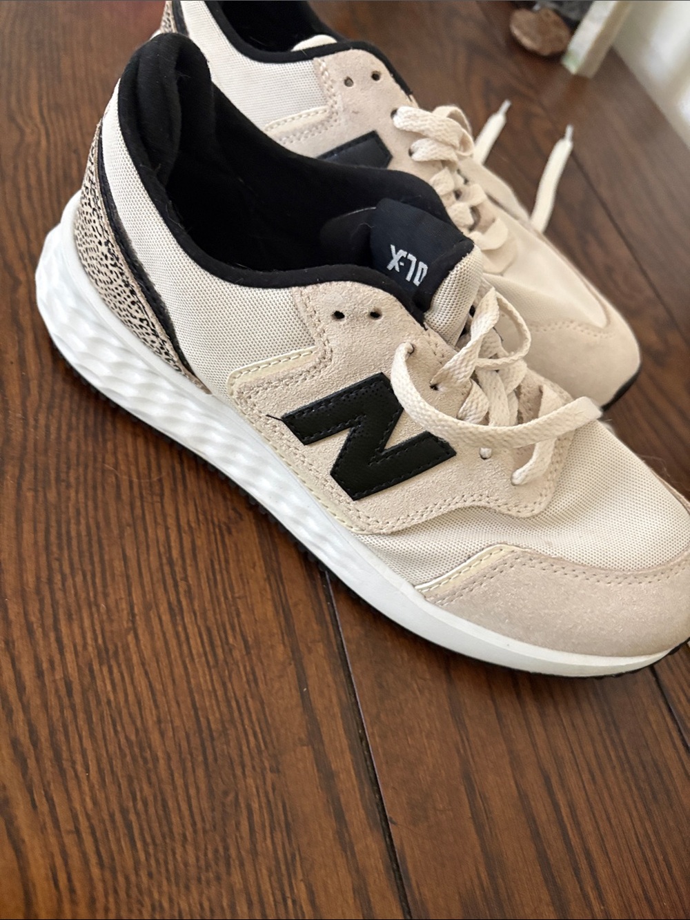 New Balance Women's Beige Sneakers with Black Accents